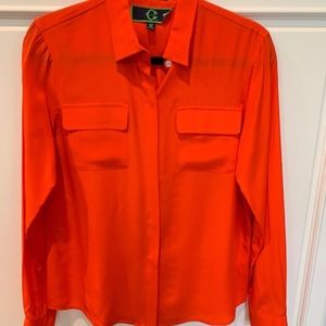 C. Wonder long sleeved orange silk blouse